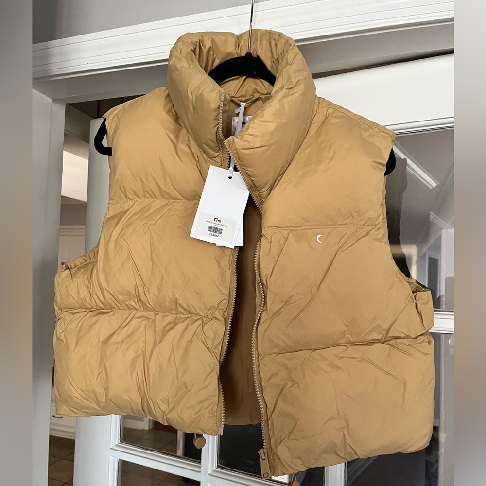 Zyia khaki puffer vest size medium, new with tags.